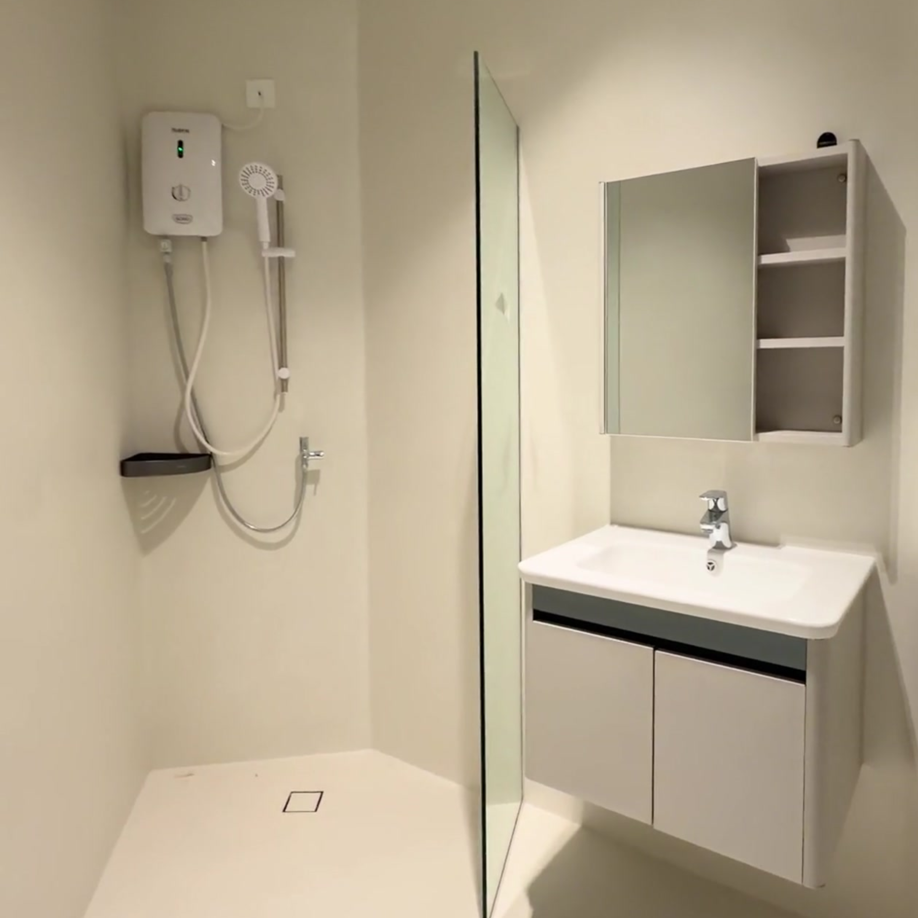 Modern bathroom with epoxy flooring and wall
